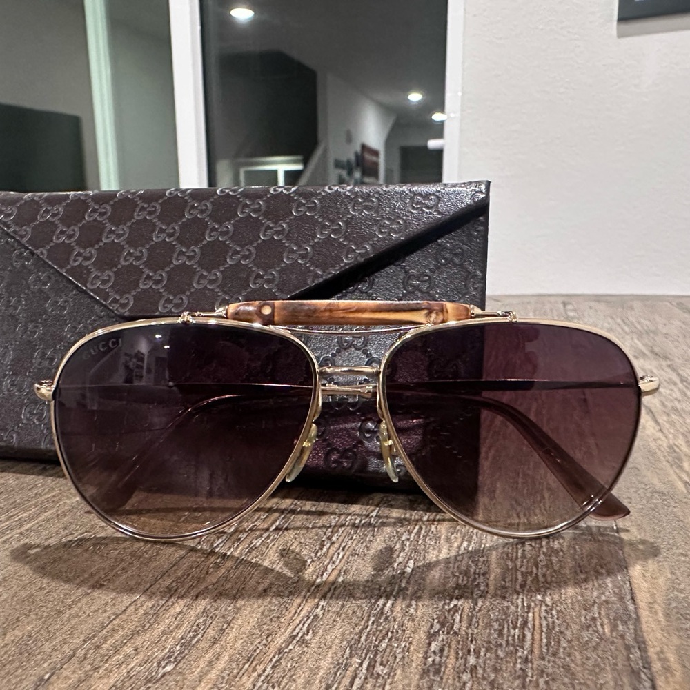 Authentic Gucci Gold Aviator Sunglasses with Purple Lenses